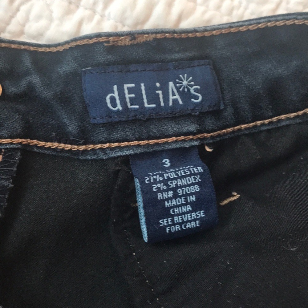 Delia’s dark wash skinny jeans